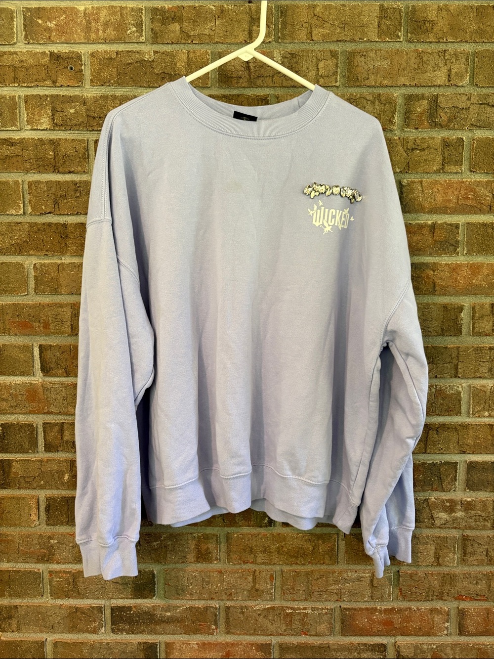 Wicked by Paul Tazewell Women's Lavender Crew Sweatshirt with Rhinestone graphic